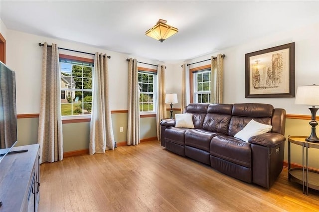 115 Winter St, Whitman, MA 02382 - living area with light wood finished floors and baseboards