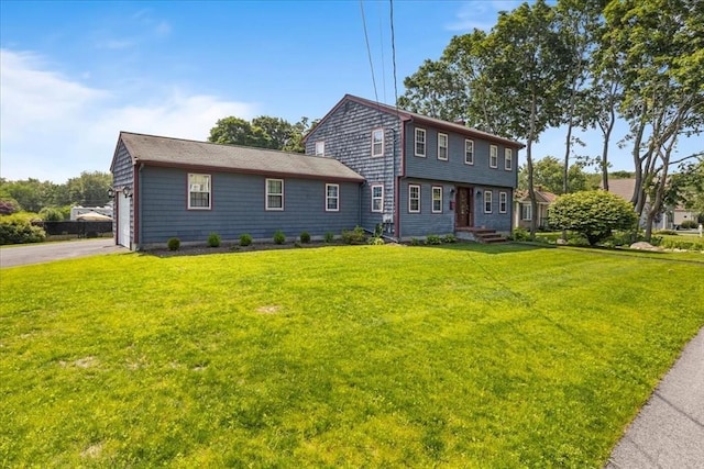 115 Winter St, Whitman, MA 02382 - colonial inspired home featuring a front lawn and driveway