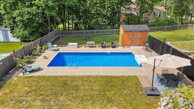 115 Winter St, Whitman, MA 02382 - view of swimming pool featuring a storage shed, a fenced backyard, and a patio