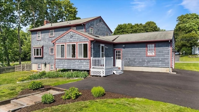 115 Winter St, Whitman, MA 02382 - view of front of property featuring a chimney and driveway