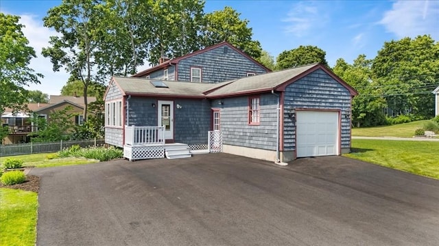 115 Winter St, Whitman, MA 02382 - view of front of property with driveway, an attached garage, and a front lawn