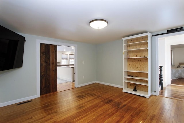 interior space with hardwood / wood-style floors