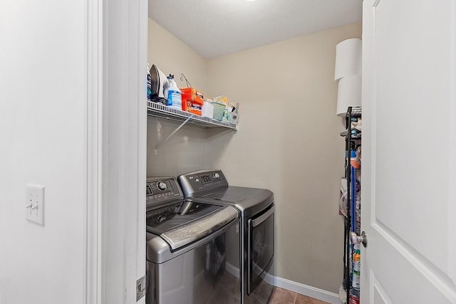 38 Phyllis Ln, Greenfield, MA 01301 - washroom featuring washer and dryer, baseboards, and tile patterned floors