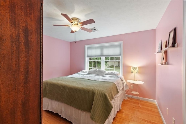 38 Phyllis Ln, Greenfield, MA 01301 - bedroom with light wood finished floors, baseboards, and a ceiling fan