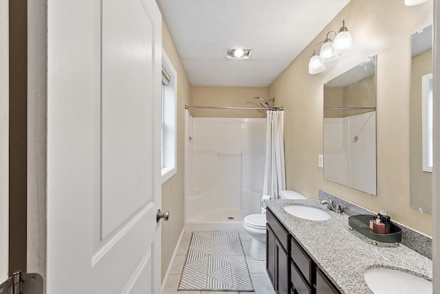 38 Phyllis Ln, Greenfield, MA 01301 - bathroom featuring toilet, a shower with shower curtain, tile patterned floors, and double vanity