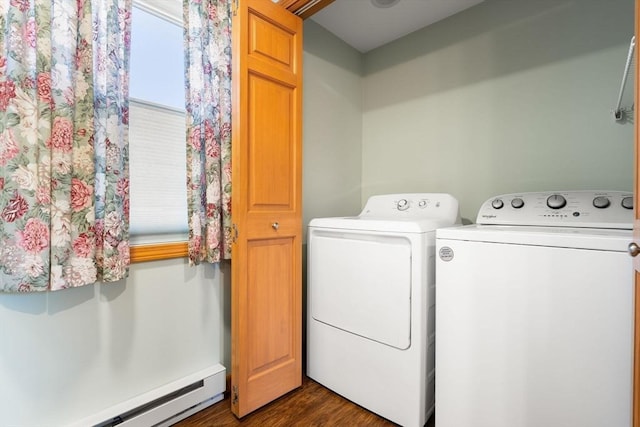 washroom featuring a baseboard heating unit, independent washer and dryer, and dark wood-style flooring