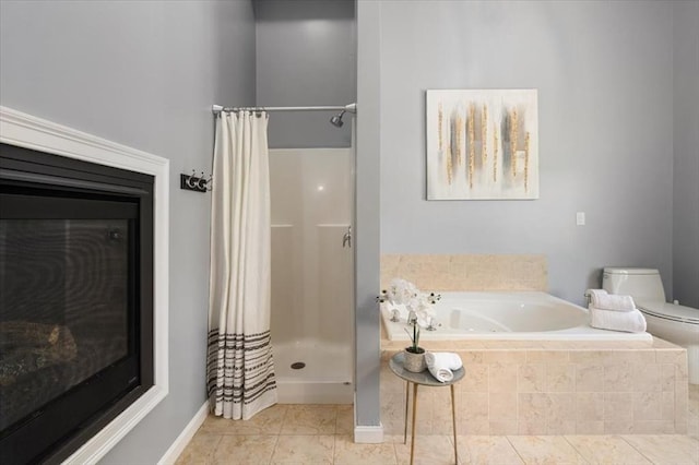 4 Patriots Blvd Unit 4, Hopkinton, MA 01748 - bathroom featuring a shower stall, tile patterned flooring, a bath, and toilet