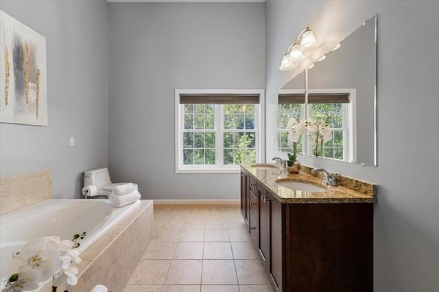 4 Patriots Blvd Unit 4, Hopkinton, MA 01748 - full bath with double vanity, a whirlpool tub, tile patterned floors, and baseboards