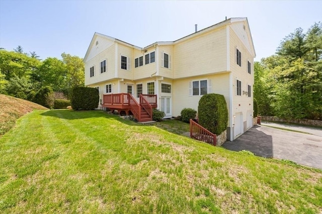 4 Patriots Blvd Unit 4, Hopkinton, MA 01748 - rear view of house featuring asphalt driveway, a deck, a garage, a yard, and stairway