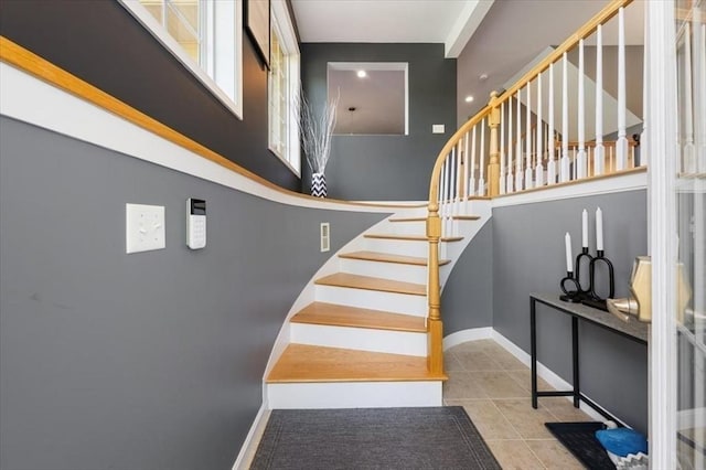 4 Patriots Blvd Unit 4, Hopkinton, MA 01748 - stairway with tile patterned floors, a towering ceiling, and baseboards