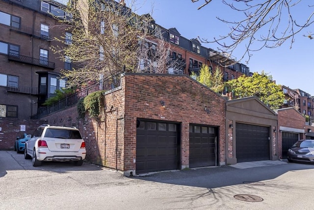 exterior space featuring community garages