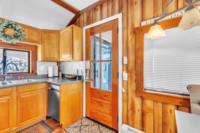 kitchen with pendant lighting, sink, backsplash, lofted ceiling with beams, and light wood-type flooring