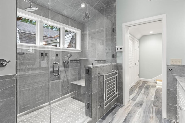 9 Twig Rush Ln, West Newbury, MA 01985 - full bathroom featuring a stall shower, vanity, and tile walls