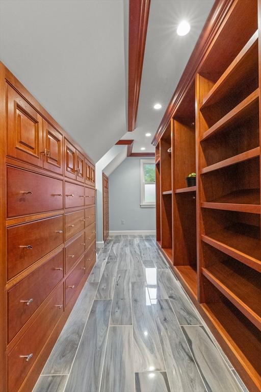 9 Twig Rush Ln, West Newbury, MA 01985 - additional living space with recessed lighting, lofted ceiling, and dark wood finished floors