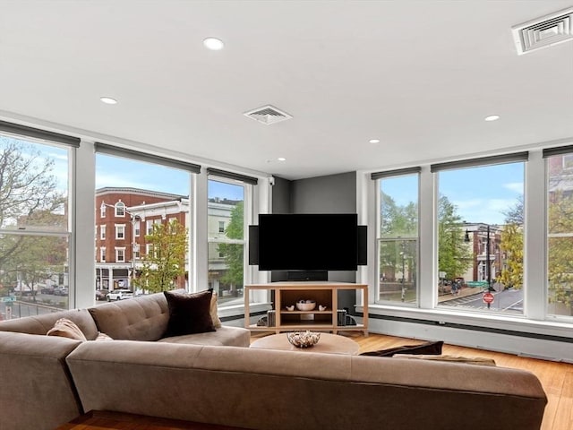 99 Washington St Unit 23, Salem, MA 01970 - living room with wood finished floors, healthy amount of natural light, and recessed lighting