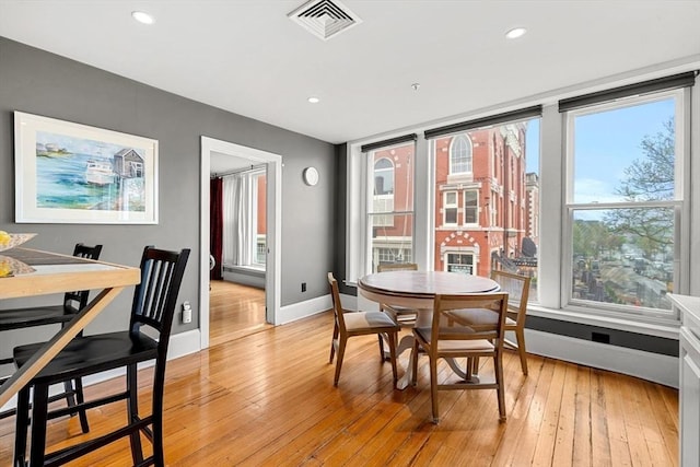 99 Washington St Unit 23, Salem, MA 01970 - dining area featuring baseboards, light wood finished floors, and recessed lighting