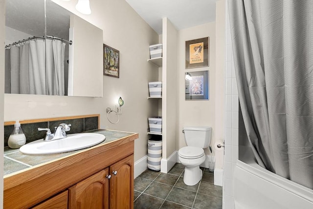 99 Washington St Unit 23, Salem, MA 01970 - full bathroom featuring toilet, tile patterned floors, baseboards, vanity, and shower / tub combo