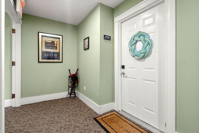 99 Washington St Unit 23, Salem, MA 01970 - carpeted entrance foyer featuring baseboards