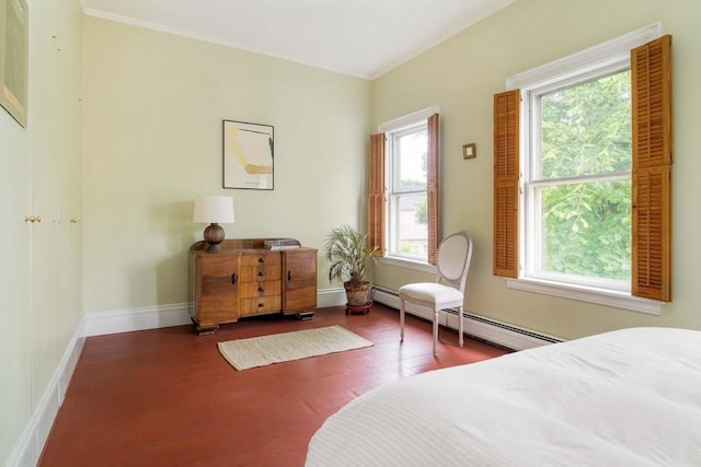 8 Oak St Unit 8, Cambridge, MA 02139 - bedroom with wood finished floors and a baseboard heating unit