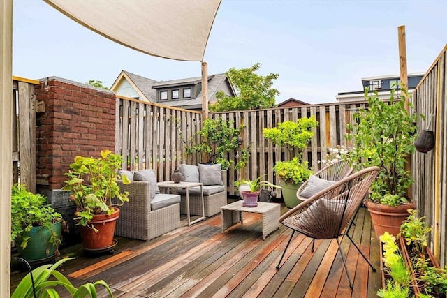 8 Oak St Unit 8, Cambridge, MA 02139 - deck featuring an outdoor hangout area and a fenced backyard