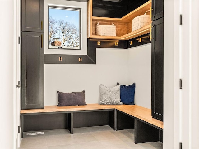 mudroom with light tile patterned floors