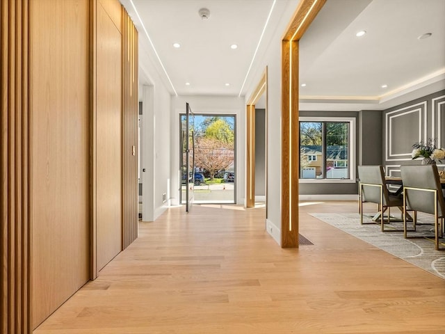 corridor featuring light hardwood / wood-style flooring