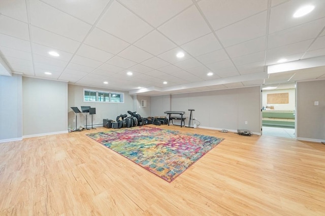 exercise area featuring light hardwood / wood-style flooring