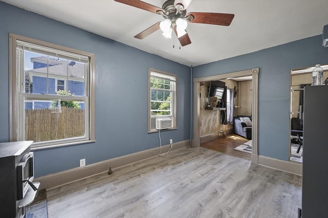 42 Briggs Ave, Pittsfield, MA 01201 - unfurnished bedroom with wood finished floors, baseboards, cooling unit, and ceiling fan