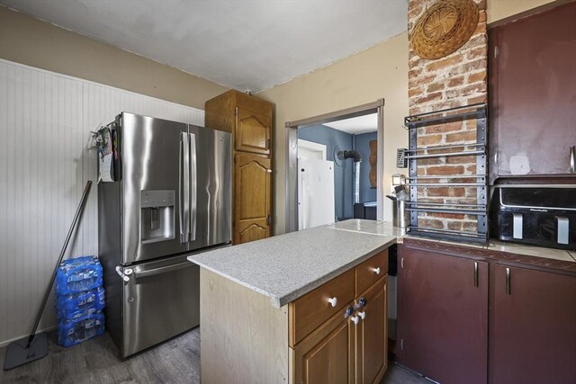 42 Briggs Ave, Pittsfield, MA 01201 - kitchen with stainless steel refrigerator with ice dispenser, dark wood finished floors, brown cabinetry, and light countertops