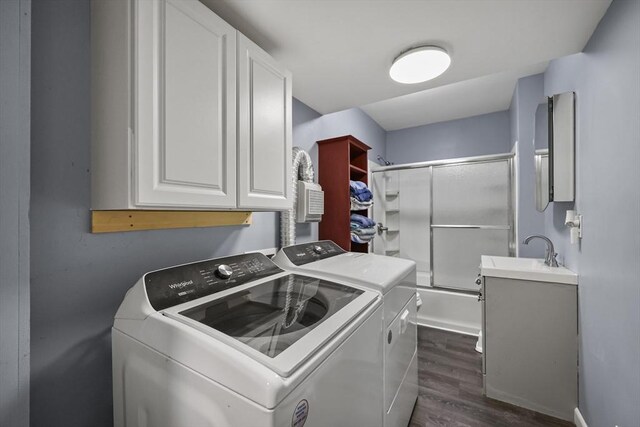 42 Briggs Ave, Pittsfield, MA 01201 - laundry room featuring washing machine and clothes dryer, cabinet space, and dark wood finished floors