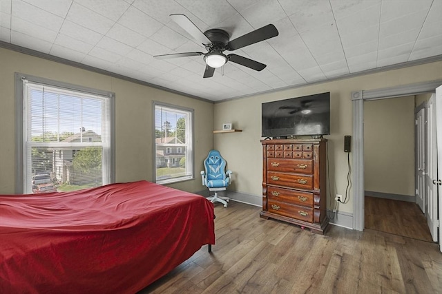 42 Briggs Ave, Pittsfield, MA 01201 - bedroom with crown molding, wood finished floors, baseboards, and a ceiling fan