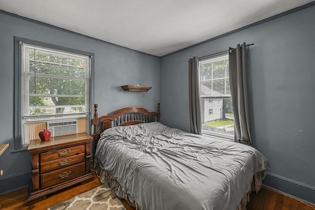 42 Briggs Ave, Pittsfield, MA 01201 - bedroom with wood finished floors, cooling unit, and baseboards