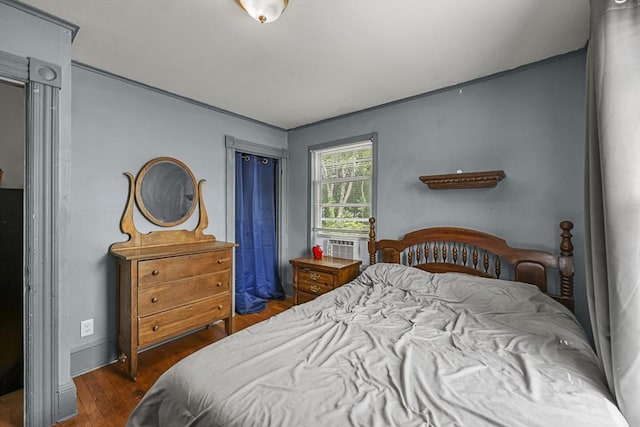42 Briggs Ave, Pittsfield, MA 01201 - bedroom with dark wood-style flooring and cooling unit