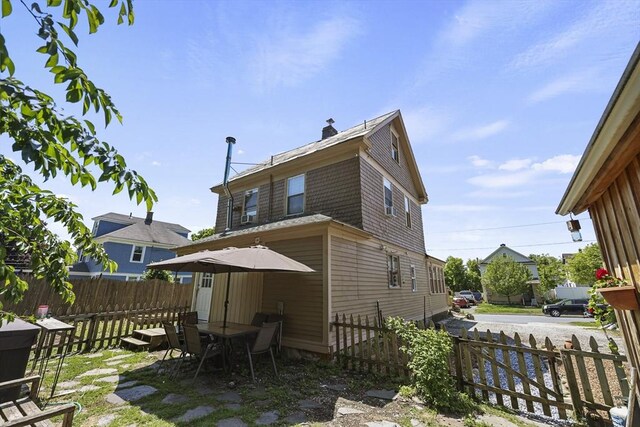 42 Briggs Ave, Pittsfield, MA 01201 - rear view of property featuring a chimney