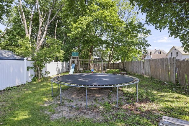 42 Briggs Ave, Pittsfield, MA 01201 - view of yard with a trampoline and a playground
