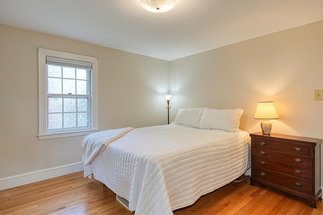 7 Broad St, Belmont, MA 02478 - bedroom featuring light wood-style floors and baseboards