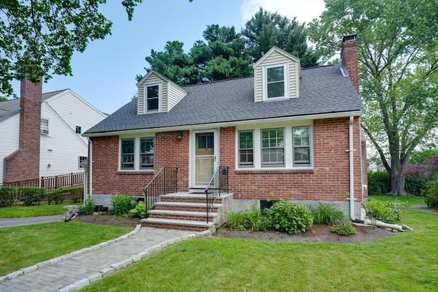 7 Broad St, Belmont, MA 02478 - cape cod home with brick siding, a chimney, a shingled roof, and entry steps