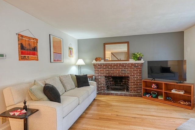 7 Broad St, Belmont, MA 02478 - living room with wood finished floors and a fireplace