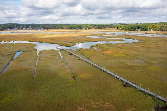 drone / aerial view with a water view and a rural view