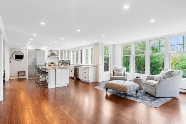 living room with dark hardwood / wood-style flooring