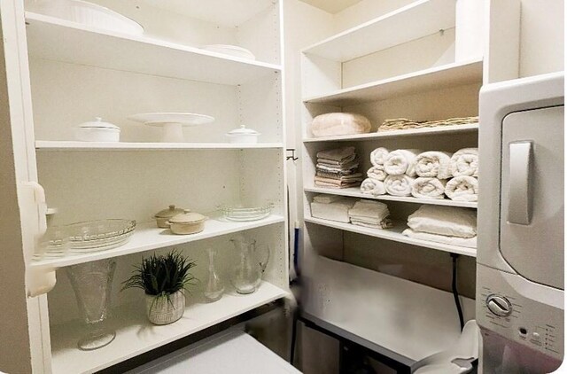 spacious closet with stacked washer / drying machine