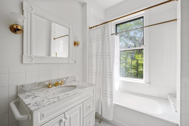 66 Rutland St, Boston, MA 02118 - bathroom featuring plenty of natural light, vanity, shower / tub combo, and tile walls