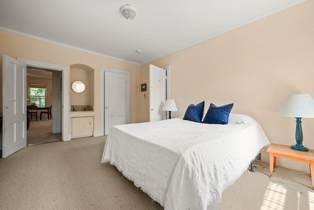 66 Rutland St, Boston, MA 02118 - bedroom with crown molding, light carpet, and arched walkways