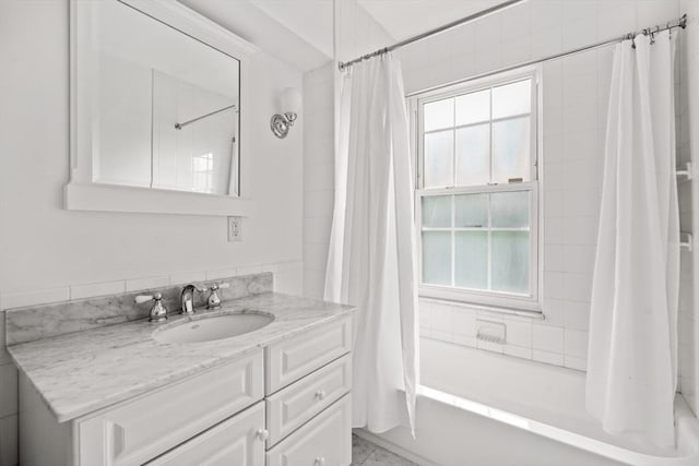 66 Rutland St, Boston, MA 02118 - bathroom featuring vanity and shower / tub combo with curtain