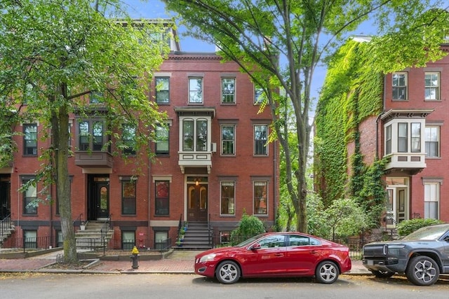 66 Rutland St, Boston, MA 02118 - townhome / multi-family property with brick siding and entry steps