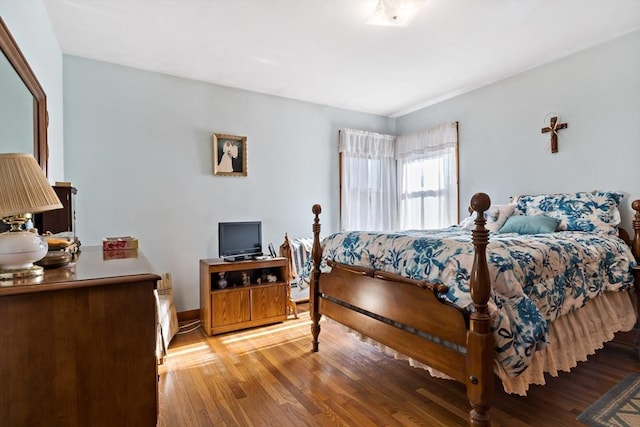 bedroom with wood-type flooring