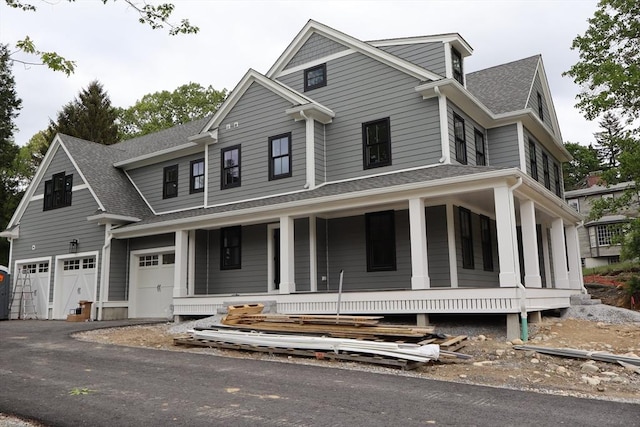 LOT2 Clifford Ln, Weston, MA 02493 - view of front of house featuring covered porch, an attached garage, and roof with shingles