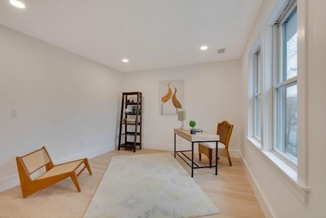 home office featuring light wood-style floors, visible vents, baseboards, and recessed lighting