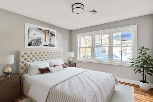 bedroom featuring light hardwood / wood-style floors