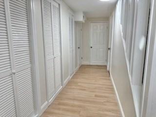 16 Fowler St, Boston, MA 02121 - hallway featuring light wood-style floors and baseboards